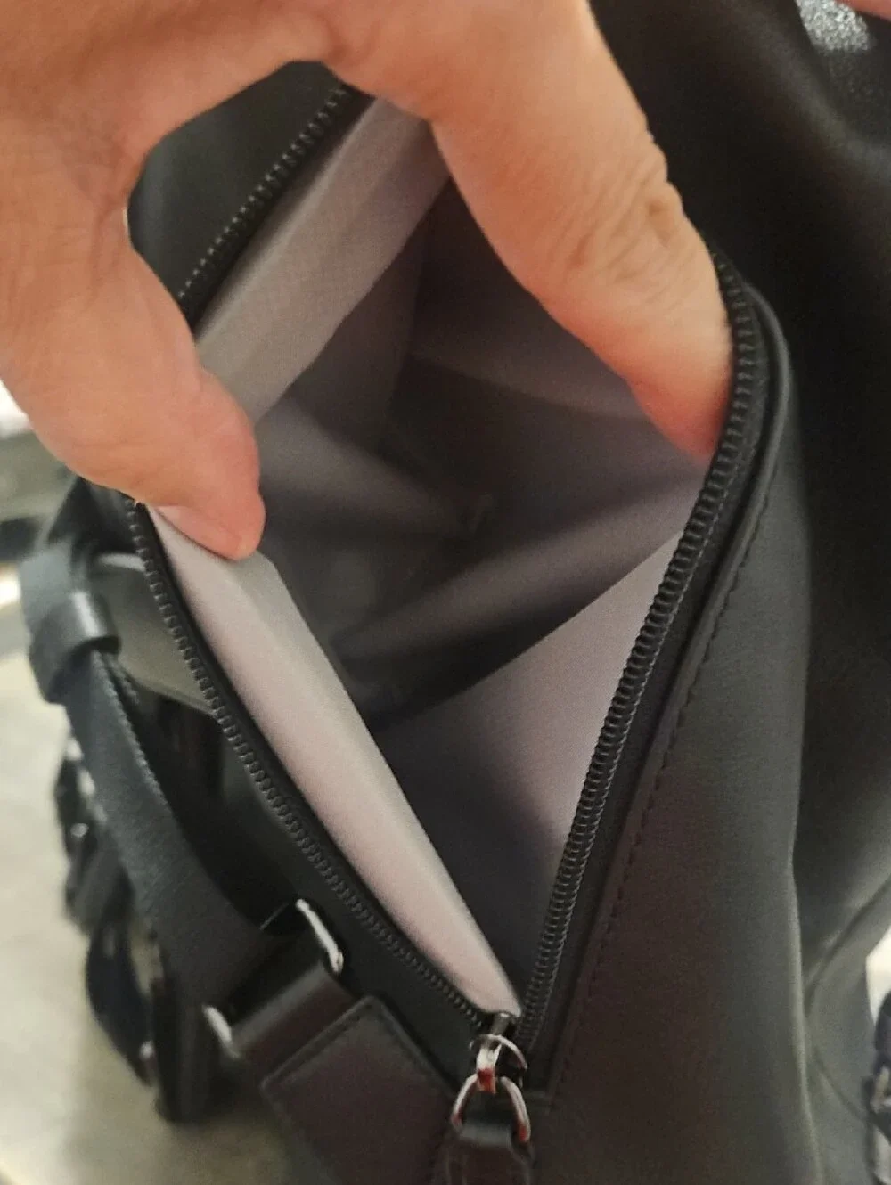 Tumi Womans Black Leather Backpack - Sleek Everyday Carry